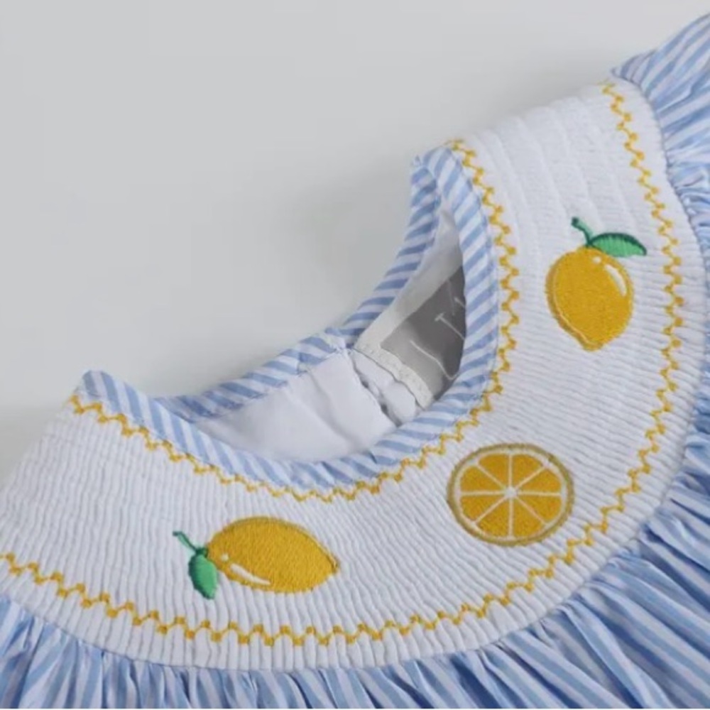 Smocked lemon with blue stripe and yellow pompom on sleeve - Picture 2 of 3
